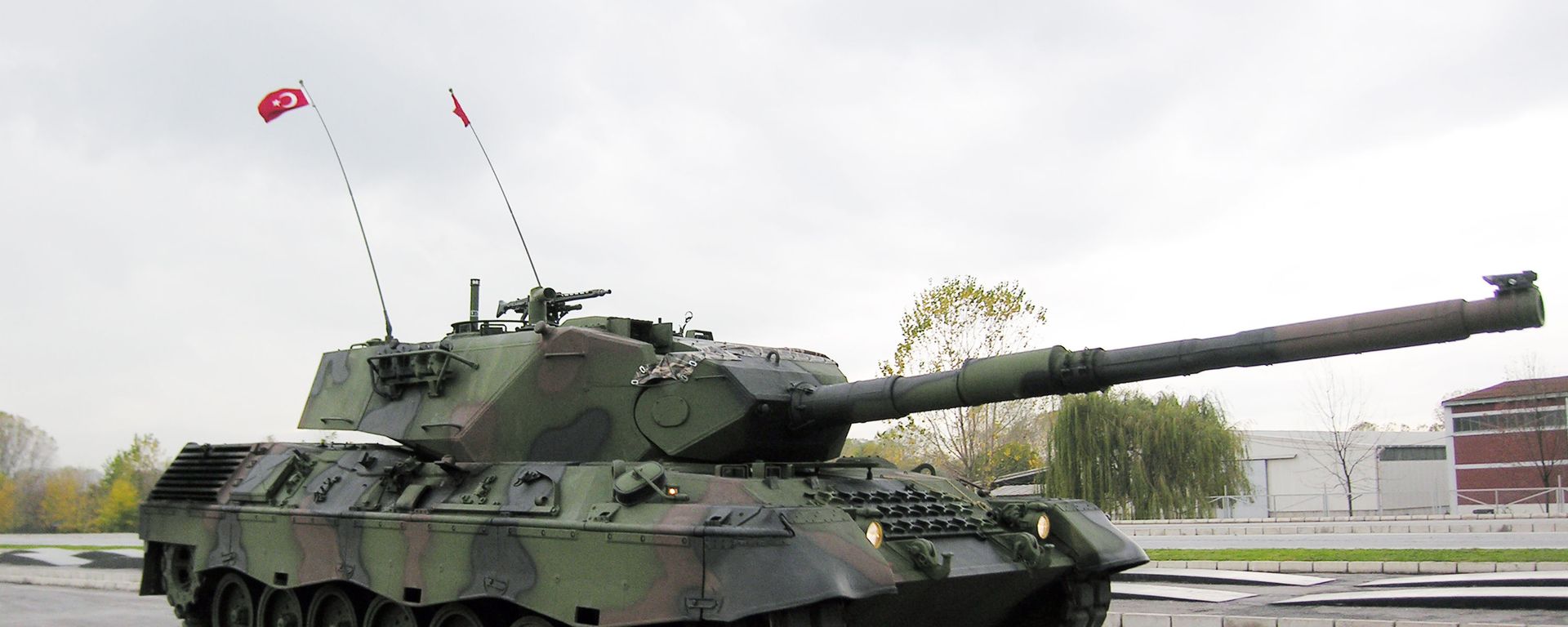 A Turkish army Leopard 1 tank drives through a test range at a military base near the western town of Arifiye, Turkey, Thursday, Nov. 12, 2009 A Turkish army Leopard 1 tank drives through a test range at a military base near the western town of Arifiye, Turkey, Thursday, Nov. 12, 2009 - Sputnik International, 1920, 03.10.2023