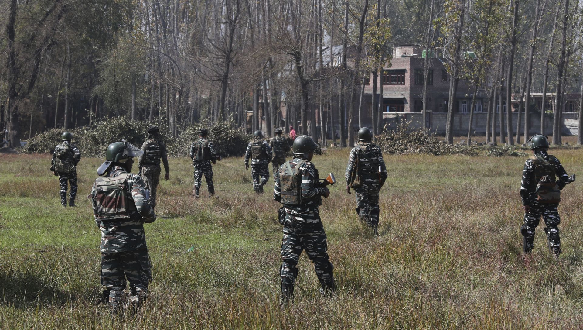 Indian paramilitary soldiers patrol near the site of a gunbattle in Bijbehara, south of Srinagar, Indian controlled Kashmir, Wednesday, Oct. 16, 2019 Indian paramilitary soldiers patrol near the site of a gunbattle in Bijbehara, south of Srinagar, Indian controlled Kashmir, Wednesday, Oct. 16, 2019 - Sputnik International, 1920, 24.02.2021