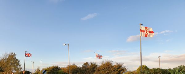 Northern Irish and British flags flying near Strabane Northern Irish and British flags flying near Strabane - Sputnik International
