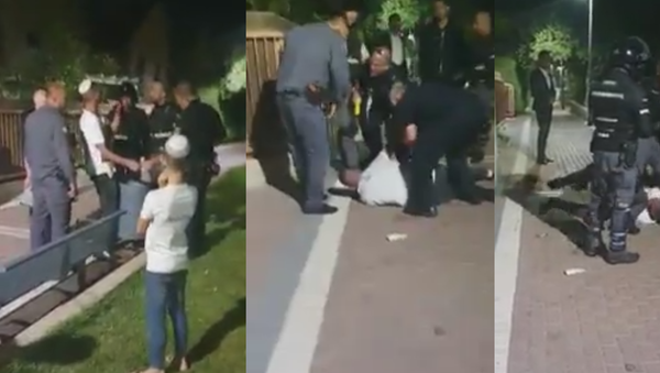 Israel Police officer suspended after using Taser on Eliran Zrihan, who refused car transportation to the station because he was observing Shabbat - Sputnik International