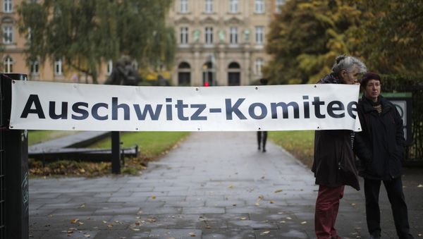 Two women of the Auschwitz Committee show a poster near the criminal court in Hamburg, Thursday, Oct. 17, 2019. 93-year-old former SS private Bruno Dey is going on trial at the court on 5,230 counts of being an accessory to murder, accused of helping the Nazis' Stutthof concentration camp function.  - Sputnik International