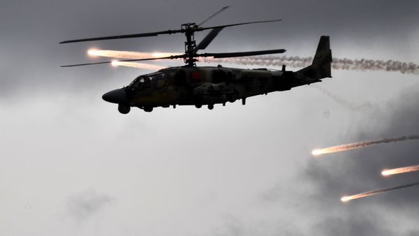 Reconnaissance and combat helicopter Ka-52 Alligator during military training - Sputnik International
