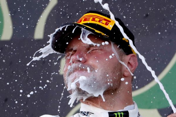 Formula One F1 - Japanese Grand Prix - Suzuka Circuit, Suzuka, Japan - October 13, 2019. Mercedes' Valtteri Bottas celebrates winning the race.  - Sputnik International