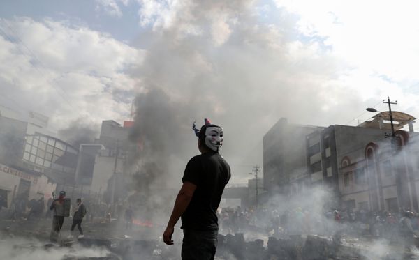 A demonstrator wearing an Anonymous mask takes part in a protest against Ecuador's President Lenin Moreno's austerity measures, in Quito, Ecuador October 12, 2019.   - Sputnik International