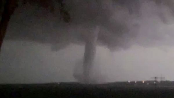 This Oct. 20, 2019 image made from video by Twitter user @AthenaRising shows the tornado in Rockwall, TX. The National Weather Service confirmed a tornado touched down in Dallas on Sunday night, causing structural damage and knocking out electricity to thousands - Sputnik International