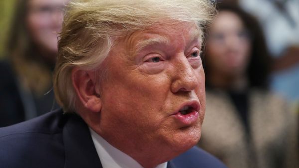 U.S. President Donald Trump holds a congratulatory phone call for the first all-female space walk outside of the International Space Station with astronauts Christina Koch and Jessica Meir at the White House in Washington, D.C., U.S. October 18, 2019 - Sputnik International