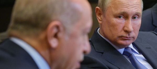 Russian President Vladimir Putin listens to his Turkish counterpart Recep Tayyip Erdogan during their meeting in the Black Sea resort of Sochi, Russia Russian President Vladimir Putin listens to his Turkish counterpart Recep Tayyip Erdogan during their meeting in the Black Sea resort of Sochi, Russia - Sputnik International