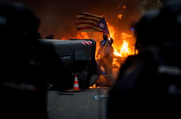 A man takes part in a protest in Barcelona. A man takes part in a protest in Barcelona. - Sputnik International