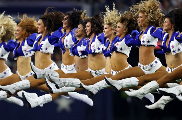 Dallas Cowboys cheerleaders perform before the game between the Dallas Cowboys and the Philadelphia Eagles at AT&T Stadium on October 20, 2019 in Arlington, Texas. Dallas Cowboys cheerleaders perform before the game between the Dallas Cowboys and the Philadelphia Eagles at AT&T Stadium on October 20, 2019 in Arlington, Texas. - Sputnik International