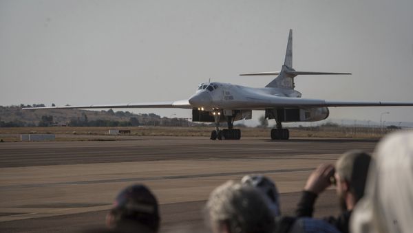 One of two Tu-160 Russian Airforce bombers land at the Waterkloof Airforce Base in Pretoria, South Africa Wednesday, Oct. 23, 2019.   - Sputnik International
