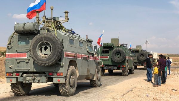 A Russian military police armored vehicles are pictured in the Syrian-Turkish border town of Kobani, Syria - Sputnik International
