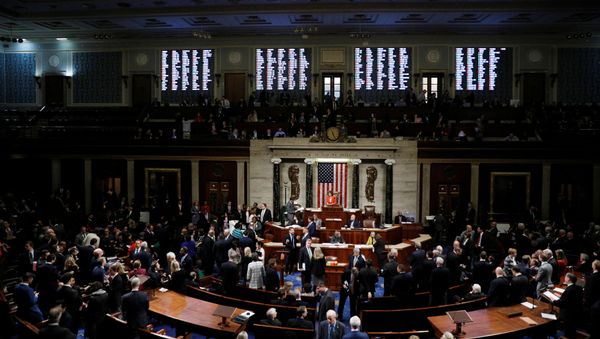 The votes of the members are displayed on an electronic tote board as the US House of Representatives cast their votes on a resolution that sets up the next steps in the impeachment inquiry directed against President Donald Trump on Capitol Hill in Washington, 31 October 2019. REUTERS/Tom Brenner - Sputnik International