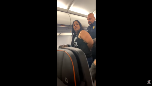 An unidentified JetBlue passenger is removed from a New York City-bound flight after making several claims that the plane was going to crash, and that it had already gone down into the water.  - Sputnik International