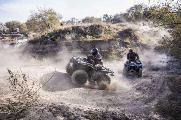 Participants steer their quad bikes during a rally, outside Bishkek, Kyrgyzstan. - Sputnik International