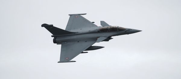 A Rafale fighter jet, manufactured by Dassault Aviation, takes part in a flying display at Saint-Dizier Air Base as the French Air Force celebrates 20,000 days of uninterrupted nuclear warning and the completion of a new round of Strategic Air Force (SAF) modernization in Saint-Dizier, France, October 4, 2019. - Sputnik International