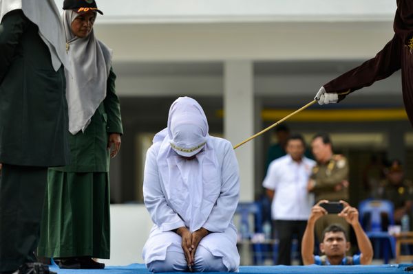 Indonesian Islamic Official Flogged in Public for Breaking the Adultery Law He Helped Oversee Indonesian Islamic Official Flogged in Public for Breaking the Adultery Law He Helped Oversee - Sputnik International