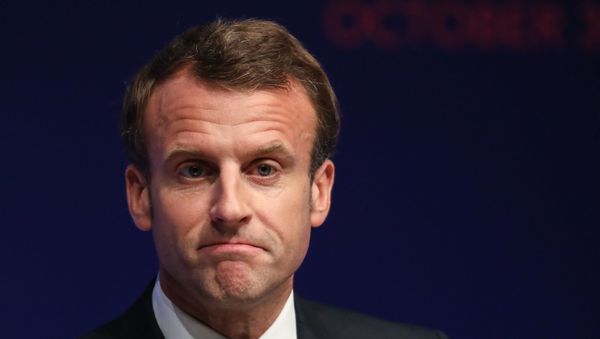 French President Emmanuel Macron reacts as he delivers a speech during the Global forum on Artificial Intelligence (AI) for Humanity (GFAIH) at the Institut de France on October 30, 2019, in Paris. French President Emmanuel Macron reacts as he delivers a speech during the Global forum on Artificial Intelligence (AI) for Humanity (GFAIH) at the Institut de France on October 30, 2019, in Paris. - Sputnik International