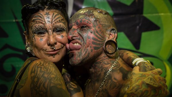 Uruguayan tattoo artist Victor Hugo Peralta and his wife, Argentinian tattoo artist Gabriela Peralta - Sputnik International