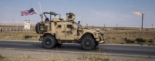 In this Monday, Oct. 28, 2019 photo, U.S. forces patrol Syrian oil fields. In this Monday, Oct. 28, 2019 photo, U.S. forces patrol Syrian oil fields. - Sputnik International