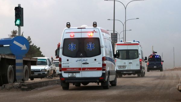 Ambulances leave the King Abdullah bin Al Hussein Training Center where a Jordanian policeman went on a shooting spree in Mwaqar on the outskirts of Amman, Jordan, Monday, Nov. 9, 2015 - Sputnik International