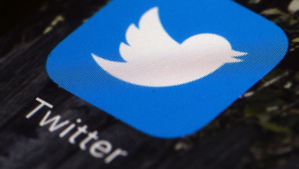 Twitter app icon on a mobile phone - Sputnik International