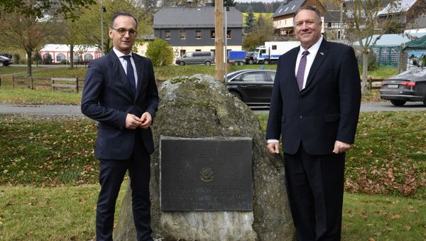 German Foreign Minister Heiko Maas and U.S. Secretary of State Mike Pompeo pose next to a memorial stone In honor of the 2d Armored Cavalry Regiment soldiers who patrolled along the Iron Curtain to protect freedom and peace in Western Europe during their visit to the village of Moedlareuth near Hof, Germany November 7, 2019 German Foreign Minister Heiko Maas and U.S. Secretary of State Mike Pompeo pose next to a memorial stone In honor of the 2d Armored Cavalry Regiment soldiers who patrolled along the Iron Curtain to protect freedom and peace in Western Europe during their visit to the village of Moedlareuth near Hof, Germany November 7, 2019 - Sputnik International