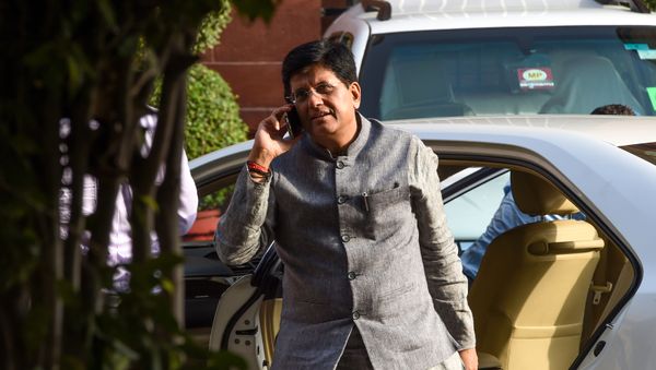 Indian minister of Railways and Commerce and Industry Piyush Goyal talks on the phone as he arrives to attend a meeting with the newly-named cabinet in New Delhi on May 31, 2019 - Sputnik International