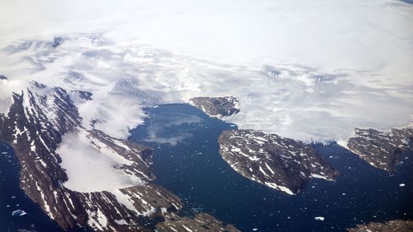 In this Thursday, Aug. 3, 2017 file photo, a glacier calves icebergs into a fjord off the Greenland ice sheet in southeastern Greenland. In this Thursday, Aug. 3, 2017 file photo, a glacier calves icebergs into a fjord off the Greenland ice sheet in southeastern Greenland. - Sputnik International