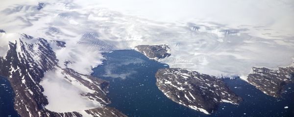 In this Thursday, Aug. 3, 2017 file photo, a glacier calves icebergs into a fjord off the Greenland ice sheet in southeastern Greenland. In this Thursday, Aug. 3, 2017 file photo, a glacier calves icebergs into a fjord off the Greenland ice sheet in southeastern Greenland. - Sputnik International