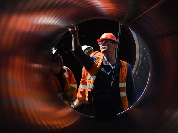 Employees work at the construction site of the Nord Stream 2 pipeline outside the town of Kingisepp, Leningrad region, Russia.  - Sputnik International