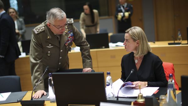 European Union Foreign Policy chief Federica Mogherini, right, talks to EU Military Committee Chairman General Claudio Graziano during a European Defense Minister meeting at the Europa building in Brussels, Tuesday, Nov. 12, 2019. - Sputnik International