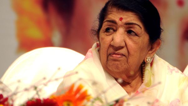 Indian Bollywood playback singer Lata Mangeshkar looks on during the '72nd Master Deenanath Mangeshkar Awards' in Mumbai on late April 24, 2014 - Sputnik International