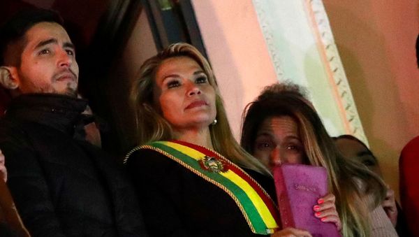 Bolivian Senator Jeanine Anez gestures after she declared herself as Interim President of Bolivia, at the balcony of the Presidential Palace, in La Paz, Bolivia November 12, 2019 - Sputnik International