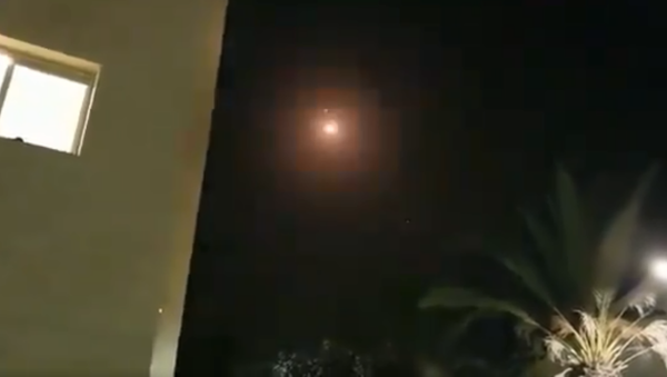 The Israel Defense Forces releases new footage showing its Iron Dome Missile Defense system intercepting a rocket launched from Gaza into southern Israel. - Sputnik International