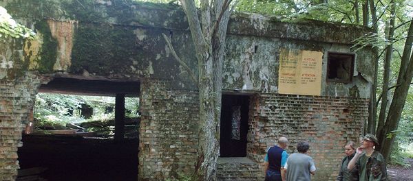 In this July 17, 2004 file photo tourists visit the ruins of Adolf Hitler's headquarters the Wolf's Lair in Gierloz, northeastern Poland, where his chief of staff members made an unsuccessful attempt at Hitler's life on July 20, 1944. Margot Woelk was one of 15 young women who sampled Hitler's food to make sure it wasn’t poisoned before it was served to the Nazi leader in his Wolf's Lair, the heavily guarded command center in what is now Poland, where he spent much of his time in the final years of World War II. Margot Woelk kept her secret hidden from the world, even from her husband then, a few months after her 95th birthday, she revealed the truth about her wartime role. In this July 17, 2004 file photo tourists visit the ruins of Adolf Hitler's headquarters the Wolf's Lair in Gierloz, northeastern Poland, where his chief of staff members made an unsuccessful attempt at Hitler's life on July 20, 1944. Margot Woelk was one of 15 young women who sampled Hitler's food to make sure it wasn’t poisoned before it was served to the Nazi leader in his Wolf's Lair, the heavily guarded command center in what is now Poland, where he spent much of his time in the final years of World War II. Margot Woelk kept her secret hidden from the world, even from her husband then, a few months after her 95th birthday, she revealed the truth about her wartime role. - Sputnik International