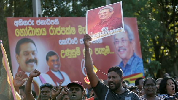 Supporters of Sri Lanka's President-elect Gotabaya Rajapaksa celebrate in Colombo, Sri Lanka Novermber 17, 2019. REUTERS/Dinuka Liyanawatte - Sputnik International