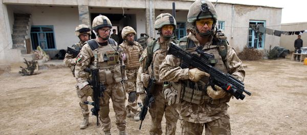British soldiers of the 1st Batallion of the Royal Welsh before a patrol in the streets of Showal in Nad-e-Ali district, Southern Afghanistan, in Helmand Province on February 25, 2010 - Sputnik International