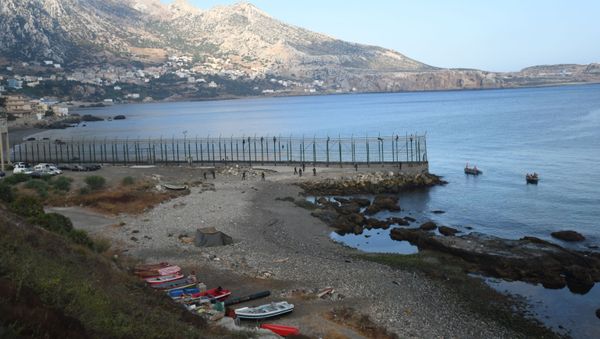 Migrants force their way into the Spanish territory of Ceuta on August 30, 2019. - Sputnik International