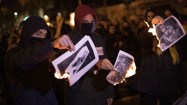People burn photos of late Spanish dictator Gen. Francisco Franco during a demonstration in Barcelona, Spain Thursday, Oct. 24, 2019. - Sputnik International