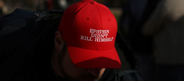 An attendee wears a hat that says Epstein Didn't Kill Himself as militia members and pro-gun rights activists participating in the Declaration of Restoration rally listen to speakers in Washington, D.C., U.S., November 9, 2019 An attendee wears a hat that says Epstein Didn't Kill Himself as militia members and pro-gun rights activists participating in the Declaration of Restoration rally listen to speakers in Washington, D.C., U.S., November 9, 2019 - Sputnik International
