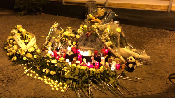 Candlelight vigil tribute constructed for two-year-old who died after being struck by an ice sculpture shard in Luxembourg's Christmas Market  - Sputnik International