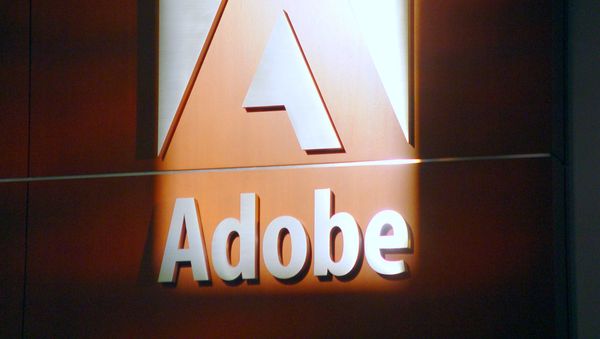 Adobe Logo - Sputnik International
