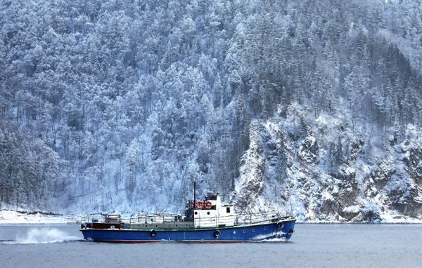 A boat navigates along the Yenisei River in Krasnoyarsk Krai, Russia A boat navigates along the Yenisei River in Krasnoyarsk Krai, Russia - Sputnik International