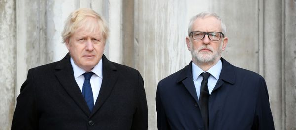 Britain's Prime Minister Boris Johnson and Britain's opposition Labour Party leader Jeremy Corbyn attend a vigil for victims of a fatal attack on London Bridge in London, Britain December 2, 2019 - Sputnik International