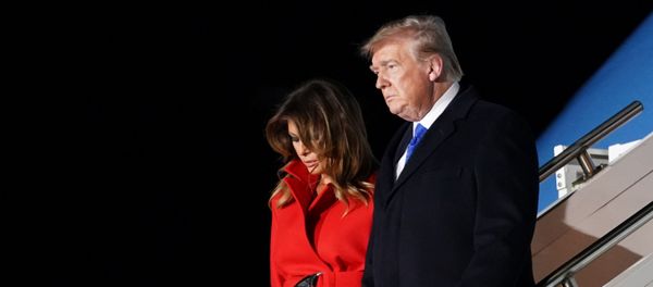 U.S. President Donald Trump and first lady Melania arrive at Stansted Airport, ahead of the NATO summit, in Stansted, Britain December 2, 2019 - Sputnik International