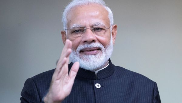 India's Prime Minister Narendra Modi greets the media prior to the BRICS summit in Brasilia, Brazil November 14, 2019 - Sputnik International