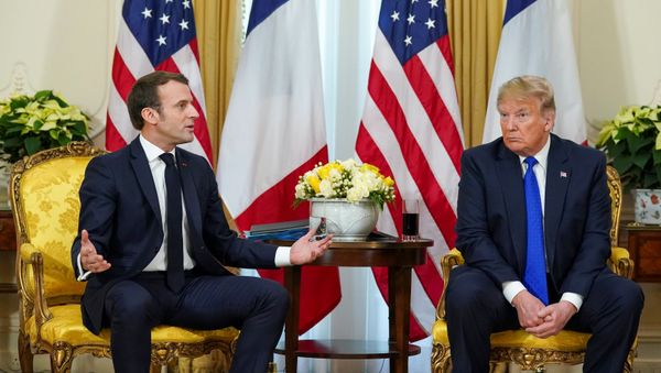 U.S. President Donald Trump looks on as France's President Emmanuel Macron talks, during a meeting ahead of the NATO summit in Watford, in London, Britain, December 3, 2019 - Sputnik International