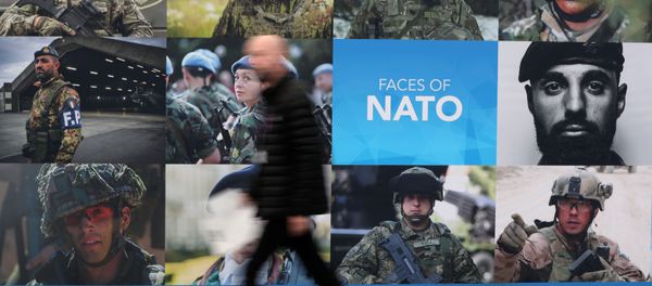 A man walks past a NATO sign ahead of a NATO leaders summit at the Grove in Watford, Britain December 3, 2019 A man walks past a NATO sign ahead of a NATO leaders summit at the Grove in Watford, Britain December 3, 2019 - Sputnik International