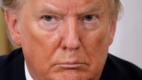 U.S. President Donald Trump reacts during the meeting with France's President Emmanuel Macron, ahead of the NATO summit in Watford, in London, Britain, December 3, 2019. Ludovic Marin - Sputnik International