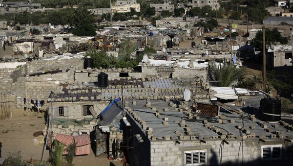 An impoverished area in the southern Gaza Strip refugee camp of Khan Yunis is pictured on May 13, 2019. - Sputnik International